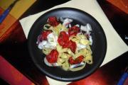 Tagliatelle con pomodoro confit e tentacoli di seppia